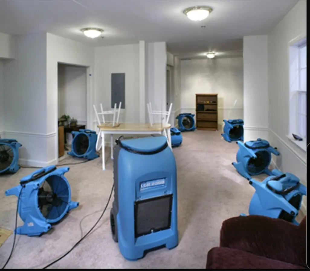 Air movers and dehumidifier setup for Water Damage Restoration in Weisenberg